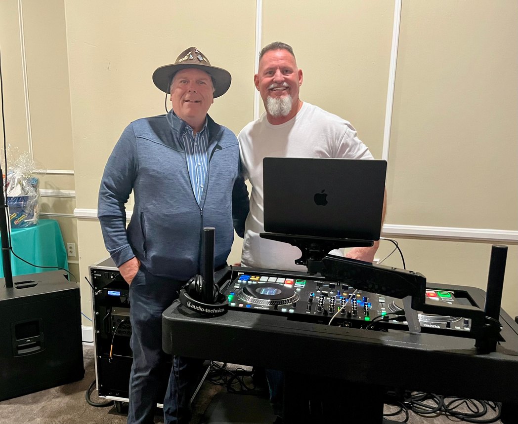 The DJ booth manned by two members